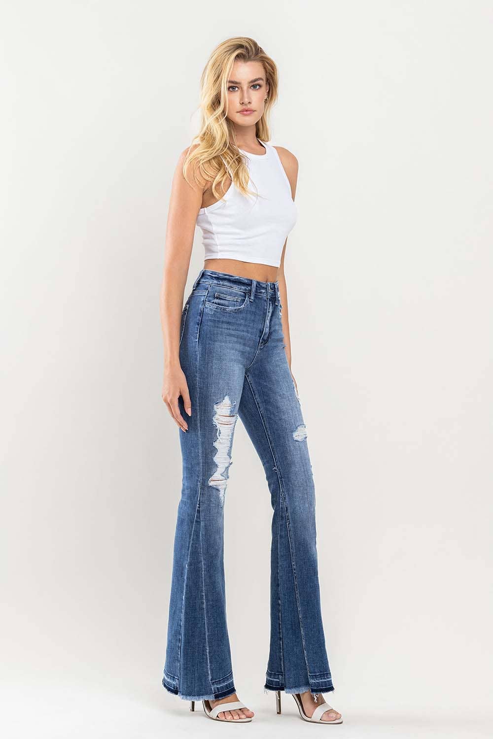 HIGH RISE DISTRESSED PANEL FLARE JEANS