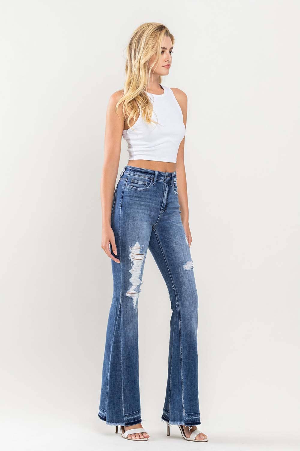 HIGH RISE DISTRESSED PANEL FLARE JEANS